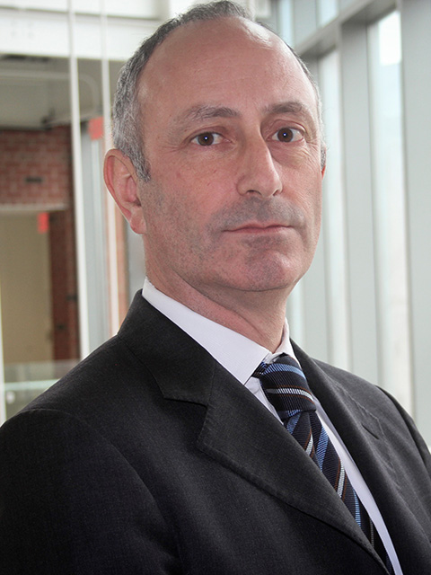 Portrait photograph of academic visitor to the School of Architecture, Building and Civil Engineering at Loughborough University, Paolo Gardini